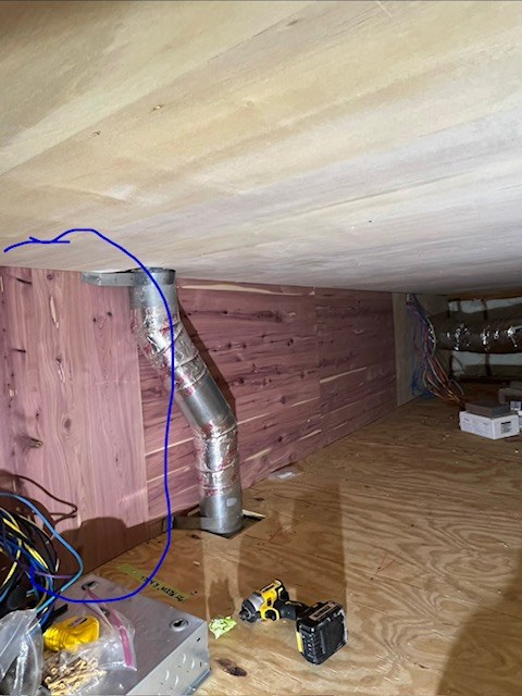 Ductwork run through a cedar-lined attic space