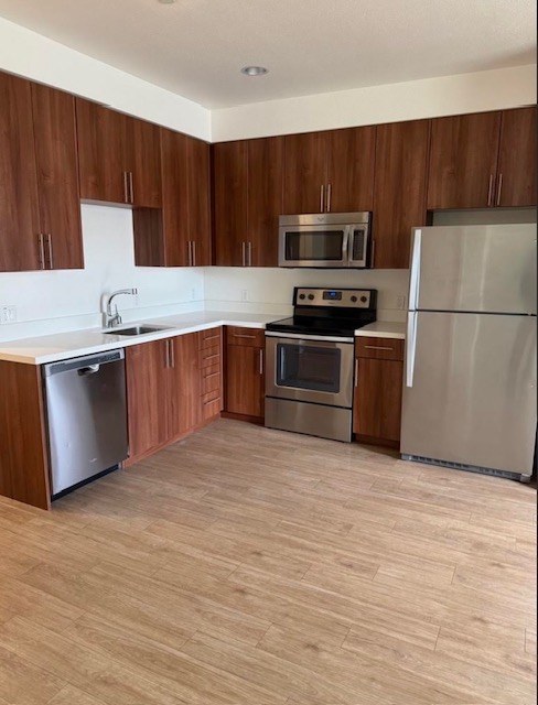Kitchen with wood cabinets and stainless appliances