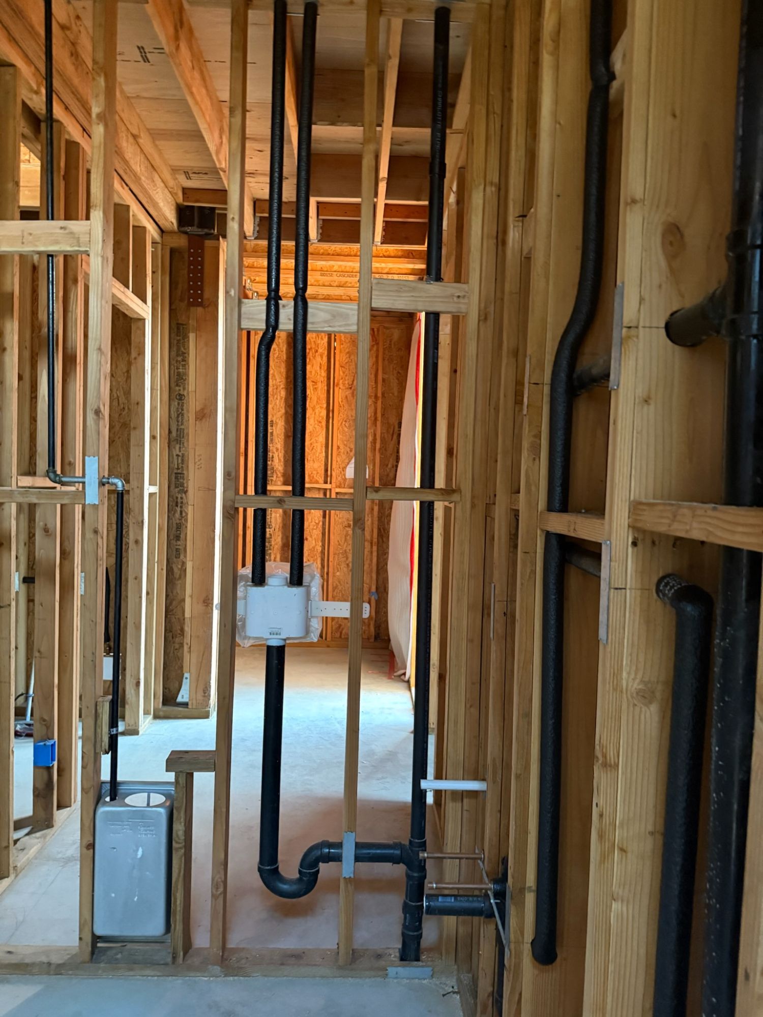 Plumbing rough-in inside framed walls